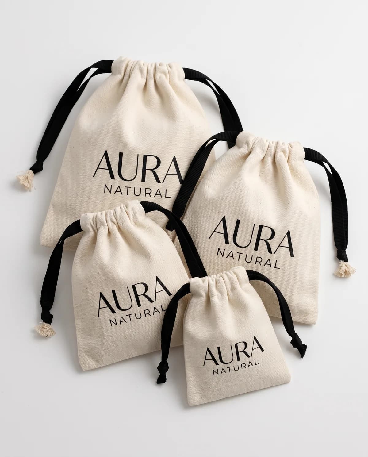 Pouches — Drawstring pouches in canvas or jute, printed with your logo.