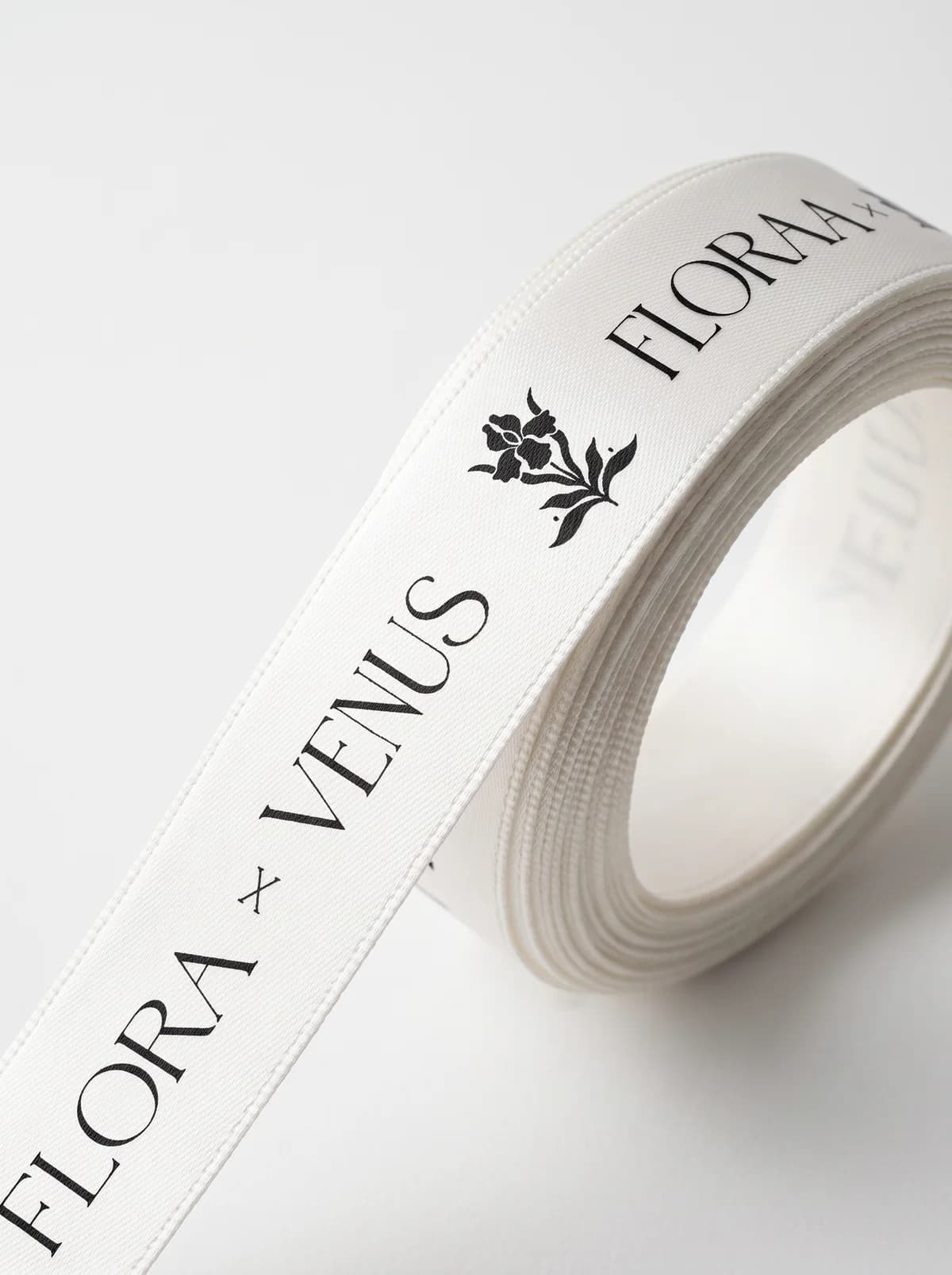Ribbons — Satin and grosgrain ribbon printed with your logo, roll after roll.